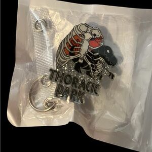 Thoracic Park Skeleton Rib Cage Badge Reel - Black, Red, Silver